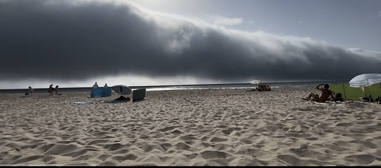 CURSE: European Heatwave Sparks Rare Tsunami Cloud Over Italian Beach